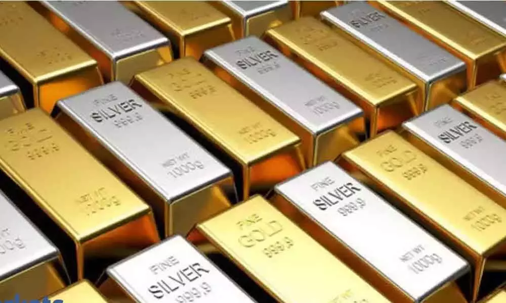 Gold, silver futures rise as Trump signs Covid relief package