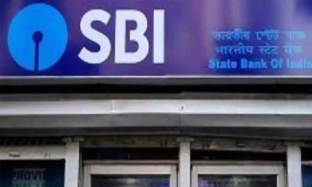 SBI Q3  net falls 7% to Rs. 5,196 cr