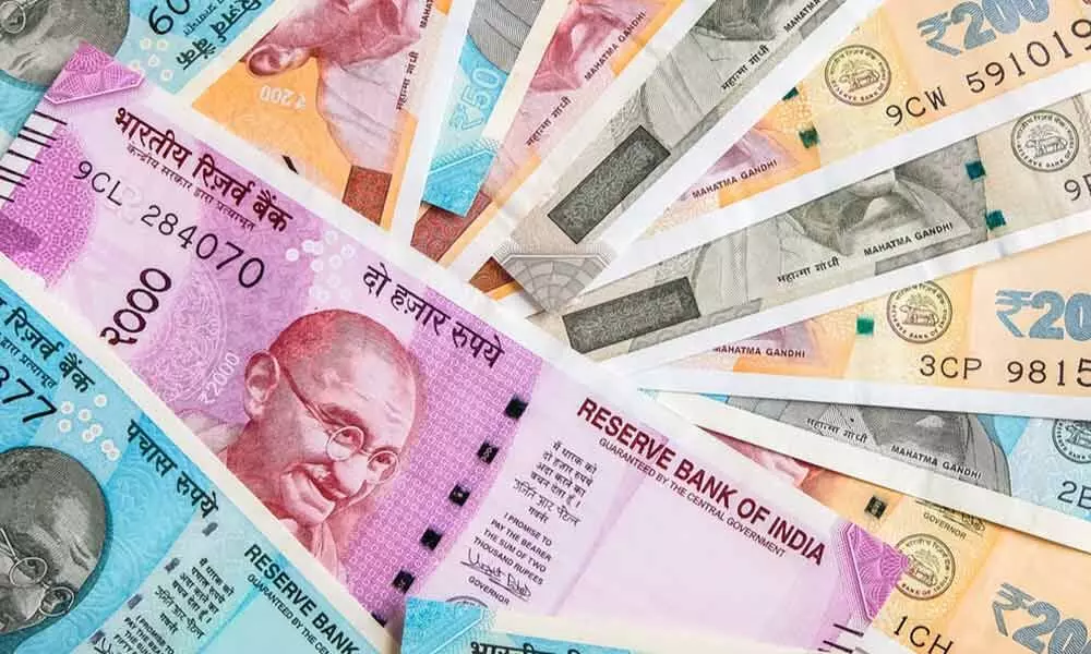 Rupee closes below 73 mark amid higher crude prices