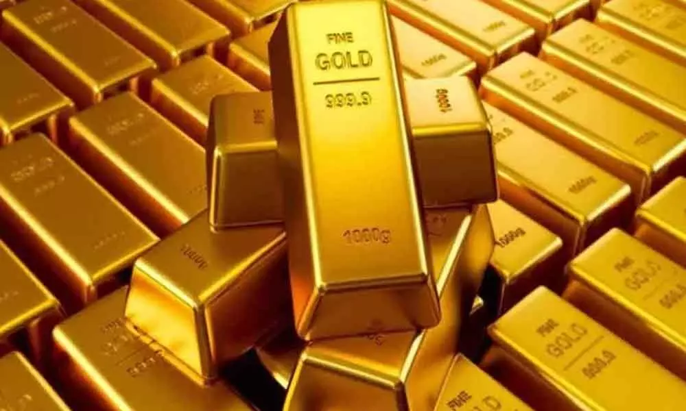 Gold snaps 3-day gain, falls Rs 263