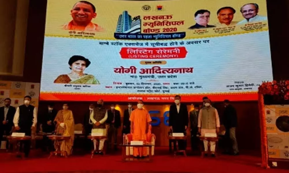 Uttar Pradesh Chief  Minister Yogi Adityanath ringing the bell at BSE marking the listing of the Lucknow Municipal Corporation bonds on Wednesday.