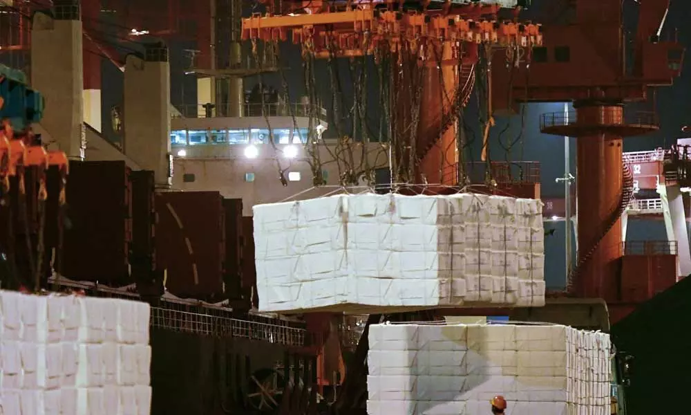 China trade surplus hits record $75 bn as Nov exports soar
