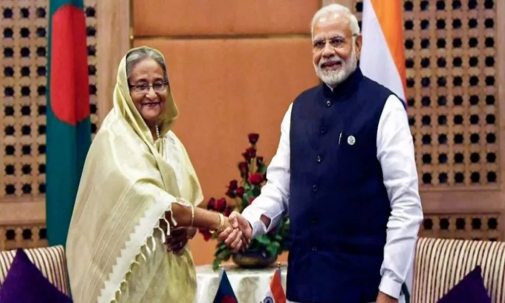 Bangladeshi counterpart Sheikh Hasina and Prime Minister Narendra Modi