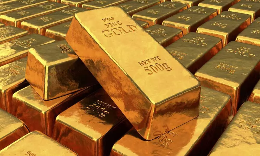 Spot gold, futures gain on firm global cues
