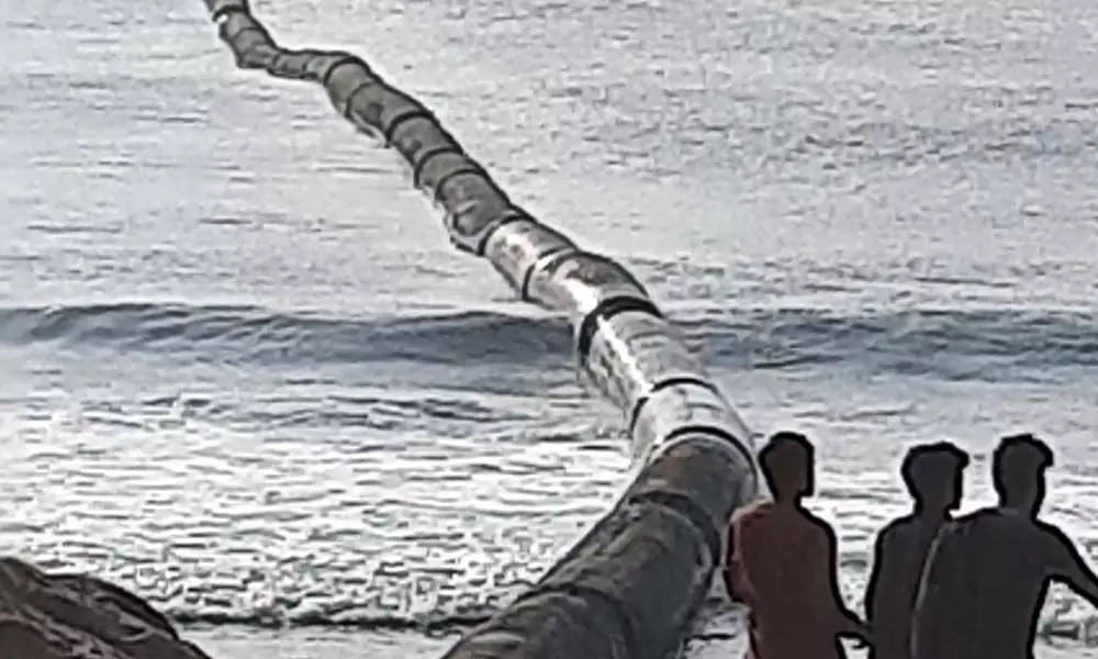 A pipeline laid near INS Kursura Submarine Museum as part of beach nourishment taken up by Visakhapatnam Port Trust by engaging Dredging Corporation of India Ltd on Wednesday. Photo: Santosh Patnaik