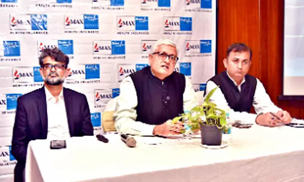 Krishnan Ramachandran, MD & CEO, Max Bupa, addressing mediapersons in Hyderabad on Tuesday. He is flanked by Bhabatosh Mishra and Praveen Pathak