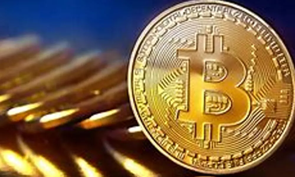 Bitcoin hits $1 trillion market cap, analysts warn “economic side show”