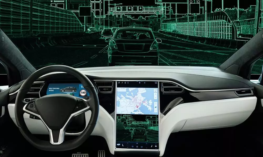 Tesla extends self-driving beta to more drivers