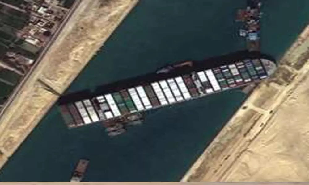 Ship blocking Suez Canal re-floats after 6 days of attempts to dislodge it