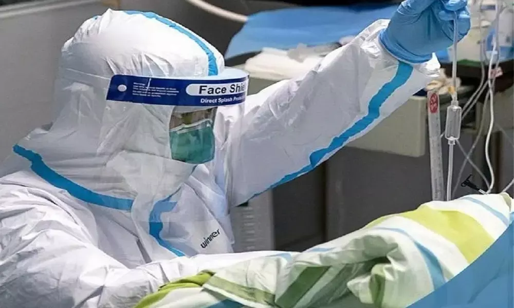 India logs record 3.52 lakh new Covid cases