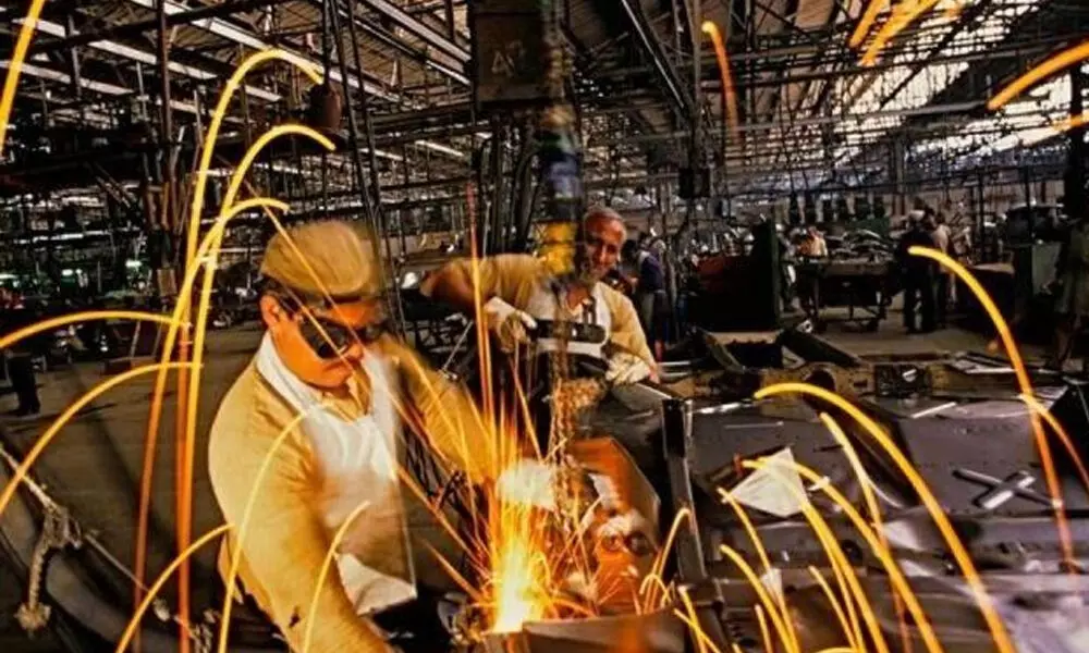 Factory output rises slowest in 8 months