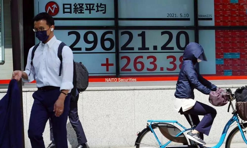 World stocks mixed as US data ease inflation worries World stocks mixed as US data ease inflation worries