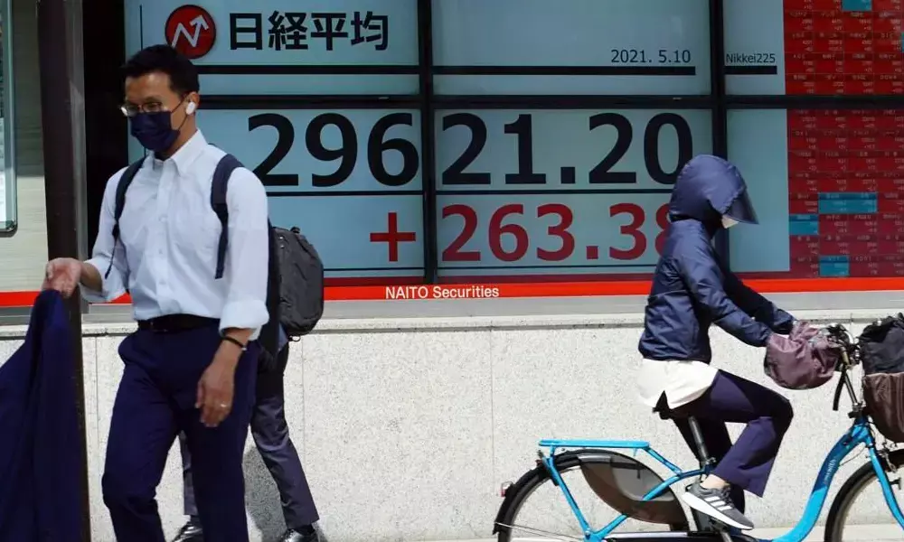 World stocks mixed as US data ease inflation worries