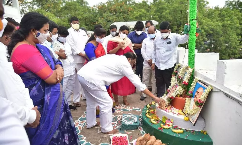 Chief Minister K Chandrasekhar Rao offering coconut before hoisting the flag to mark State Formation Day in Hyderabad on Wednesday