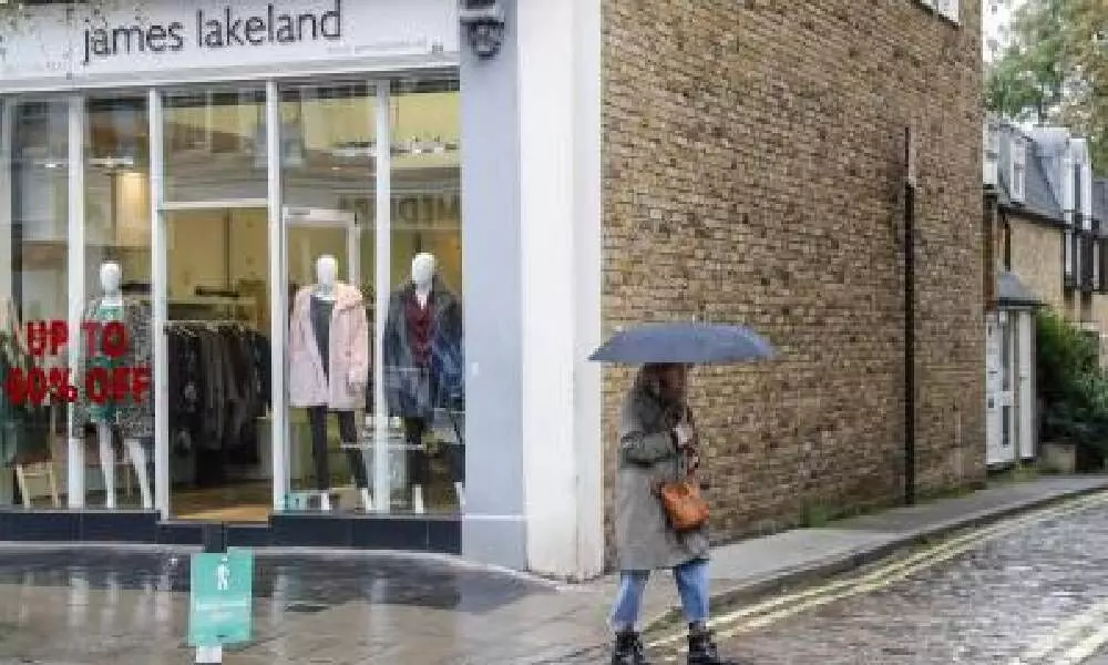 UK retail sales fall despite further easing of curbs