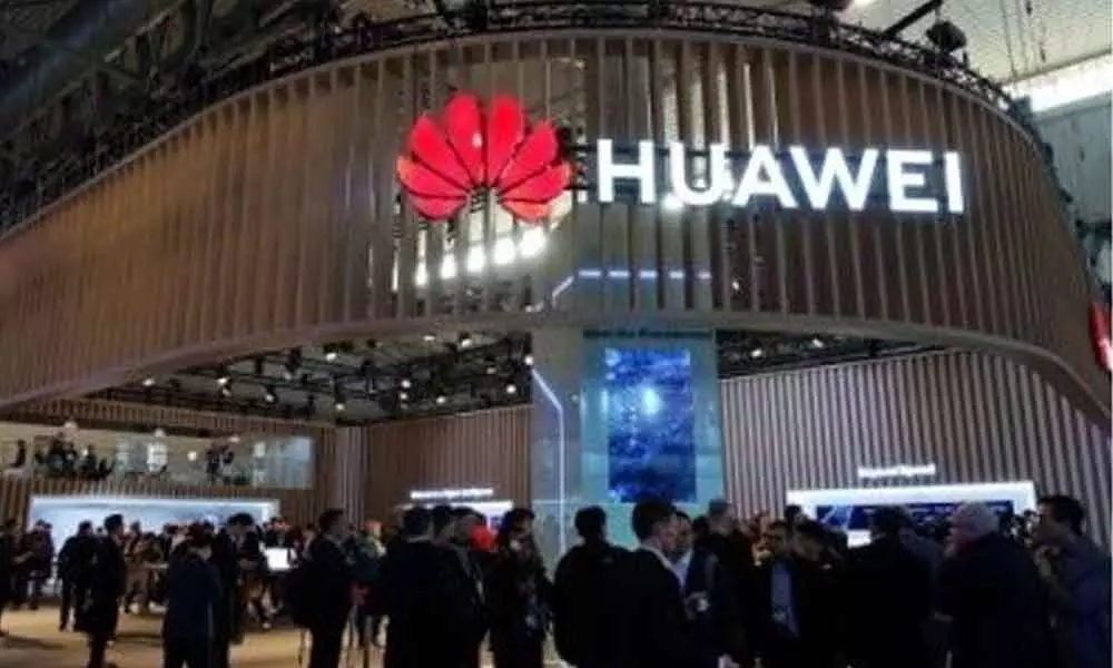 Chinese tech giant Huawei raided over tax evasion, firms says cooperating