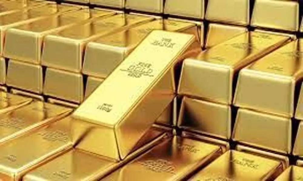 Gold, silver gain marginally on lower US treasury yields