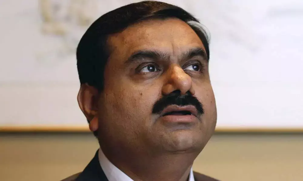 Adani increasing fossil fuel footprint despite pledge to turn carbon neutral