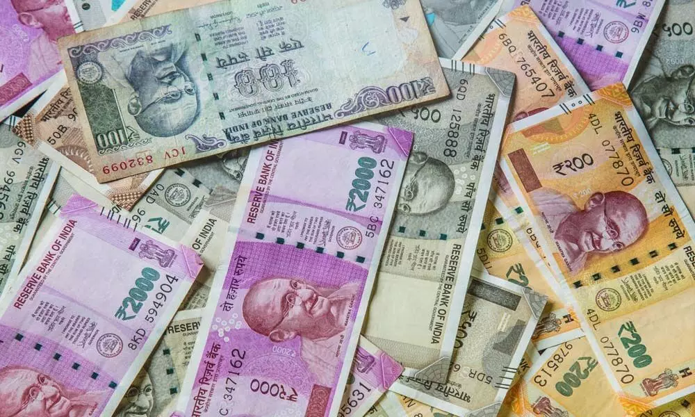 Rupee snaps 3-day losing streak