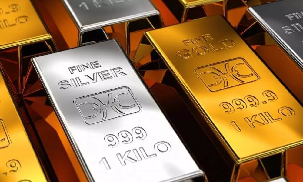 Gold down Rs 123, silver falls Rs 206