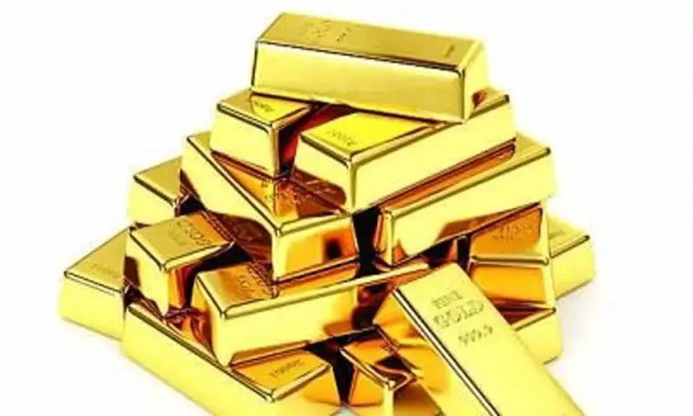 Gold eases marginally; silver gains Rs. 73