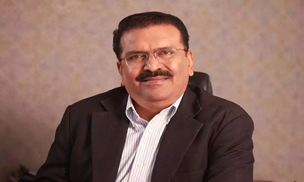 Karvy Chairman Parthasarathy held in loan default case Karvy Chairman Parthasarathy held in loan default case