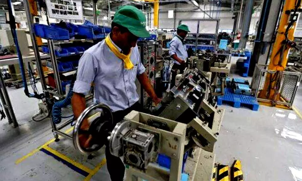 Factory output eases in August