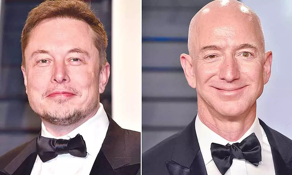 Musk soars while Bezos sues in the new space race