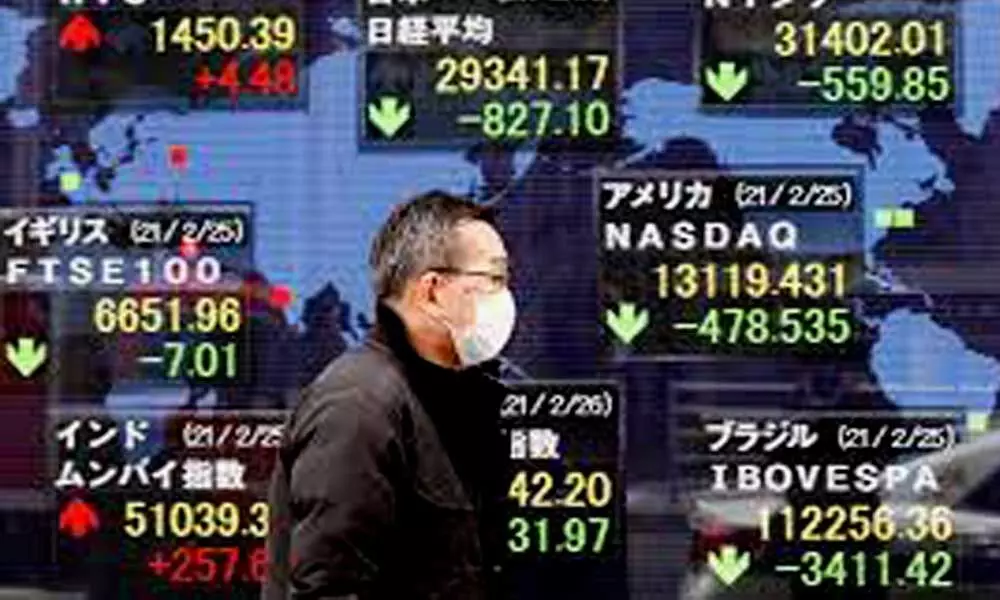 Asian stocks track broad slide on Wall St