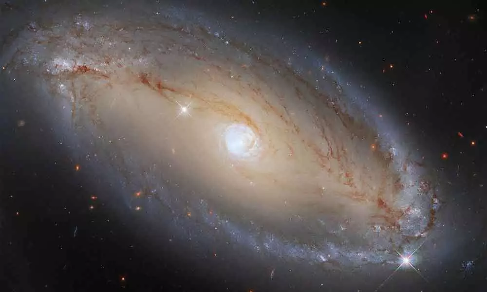 Hubble captures spiral galaxy with celestial eye