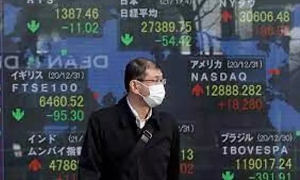 Asian shares rise as receding debt fears spur Wall St rally