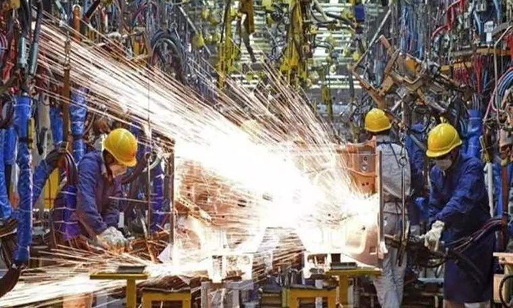 Uptick in new orders boosts factory output