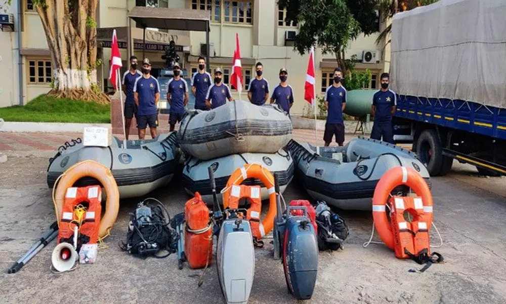 Naval ships and aircraft standby for cyclone rescue operations