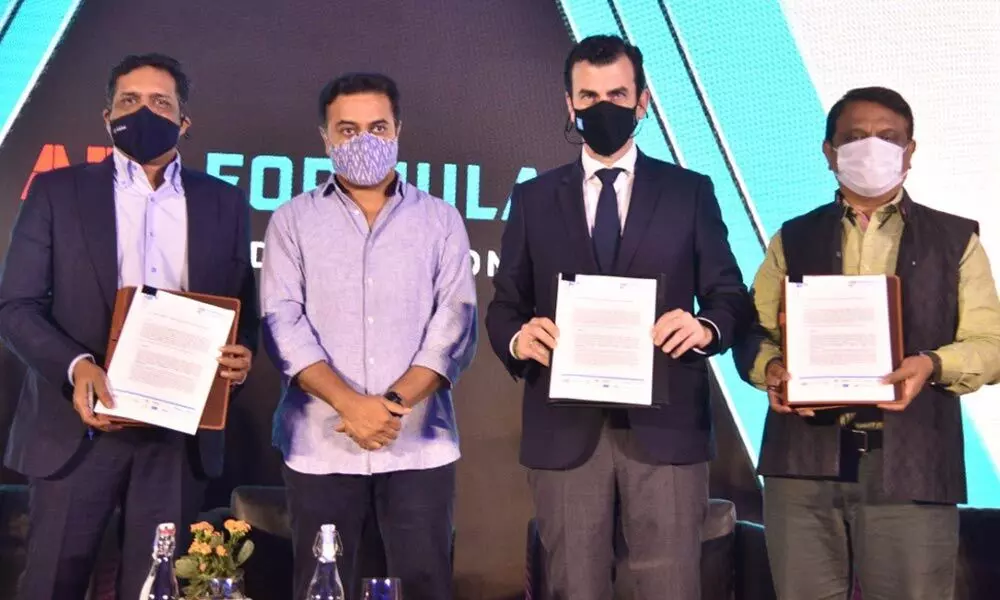 (From L-R) Greenko CEO Anil Chalamalasetty, Industries and Commerce Minister KT Rama Rao, Formula E Co Founder Alberto Longo, and MAUD Special Chief Secretary Arvind Kumar at the LOI signing ceremony in Hyderabad on Monday (From L-R) Greenko CEO Anil Chalamalasetty, Industries and Commerce Minister KT Rama Rao, Formula E Co Founder Alberto Longo, and MAUD Special Chief Secretary Arvind Kumar at the LOI signing ceremony in Hyderabad on Monday