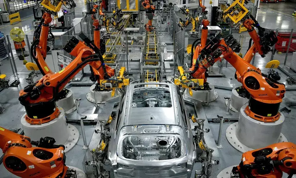 Factory output gains steam on new orders