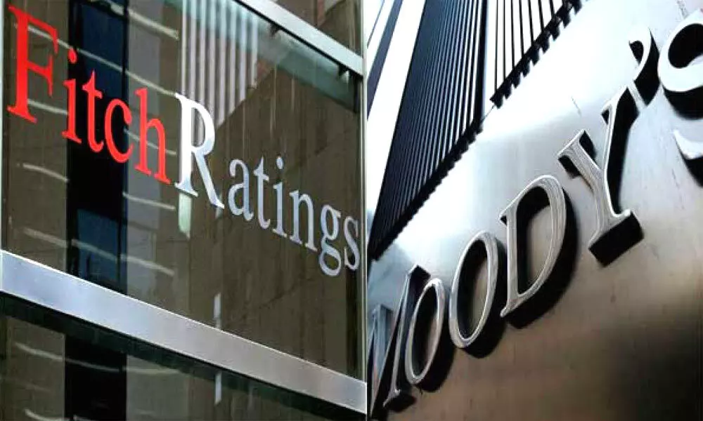 Moodys, Fitch junk Russias rating