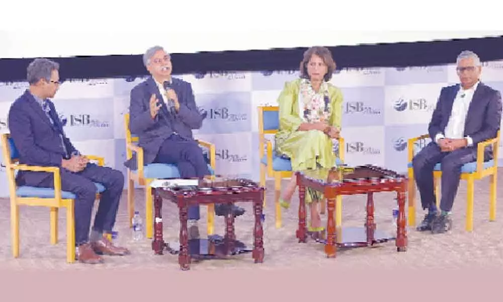 Govindraj Ethiraj, Founder, India Spend and BOOMLive moderating the discussion with Sunil Kant Munjal, Shobana Kamineni, Executive Vice Chairperson, Apollo Hospitals and Prof Madan Pillutla, Dean, at ISB Hyderabad