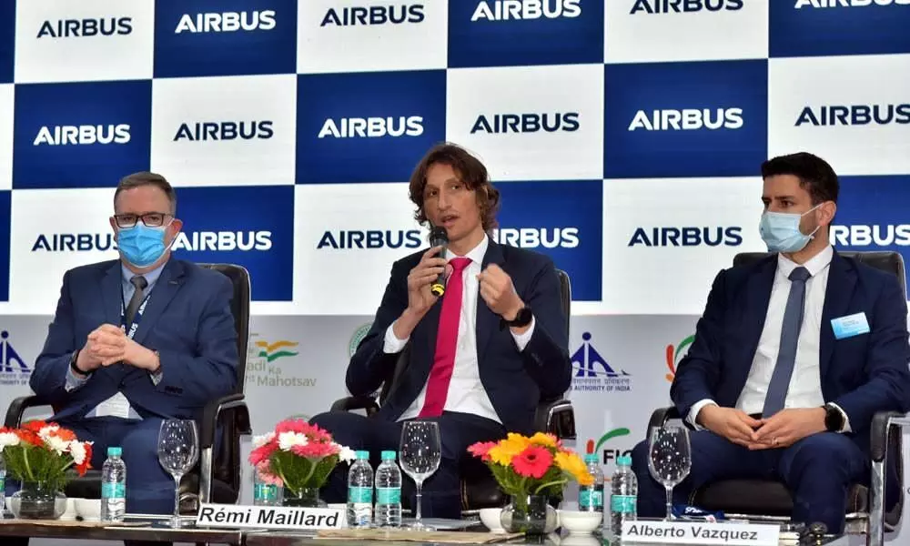 Remi Maillard (C), President and Managing Director, Airbus India & South Asia, announcing India Market Forecast at Wings India 2022 here on Thursday