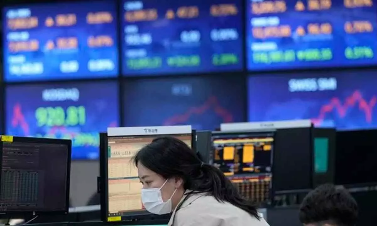 Asian shares turn mixed as China clocks 4.8% Q1 growth
