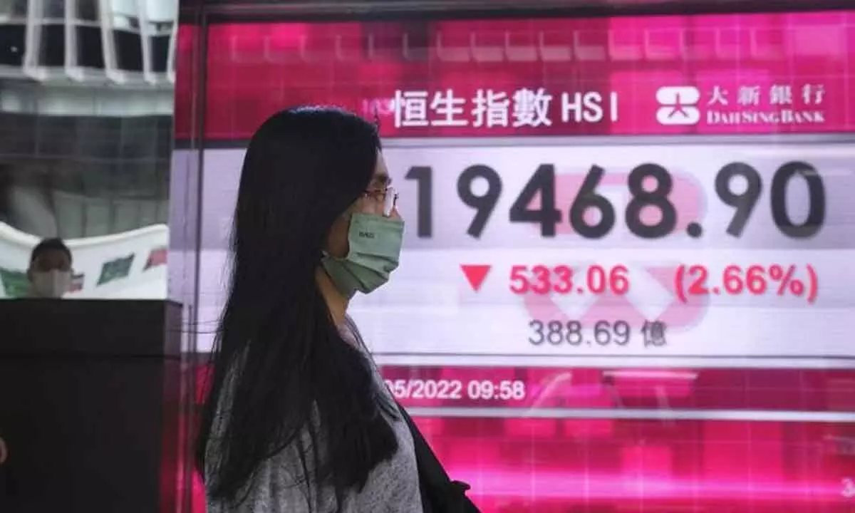 Asian stocks mixed, China gains ahead of US price data