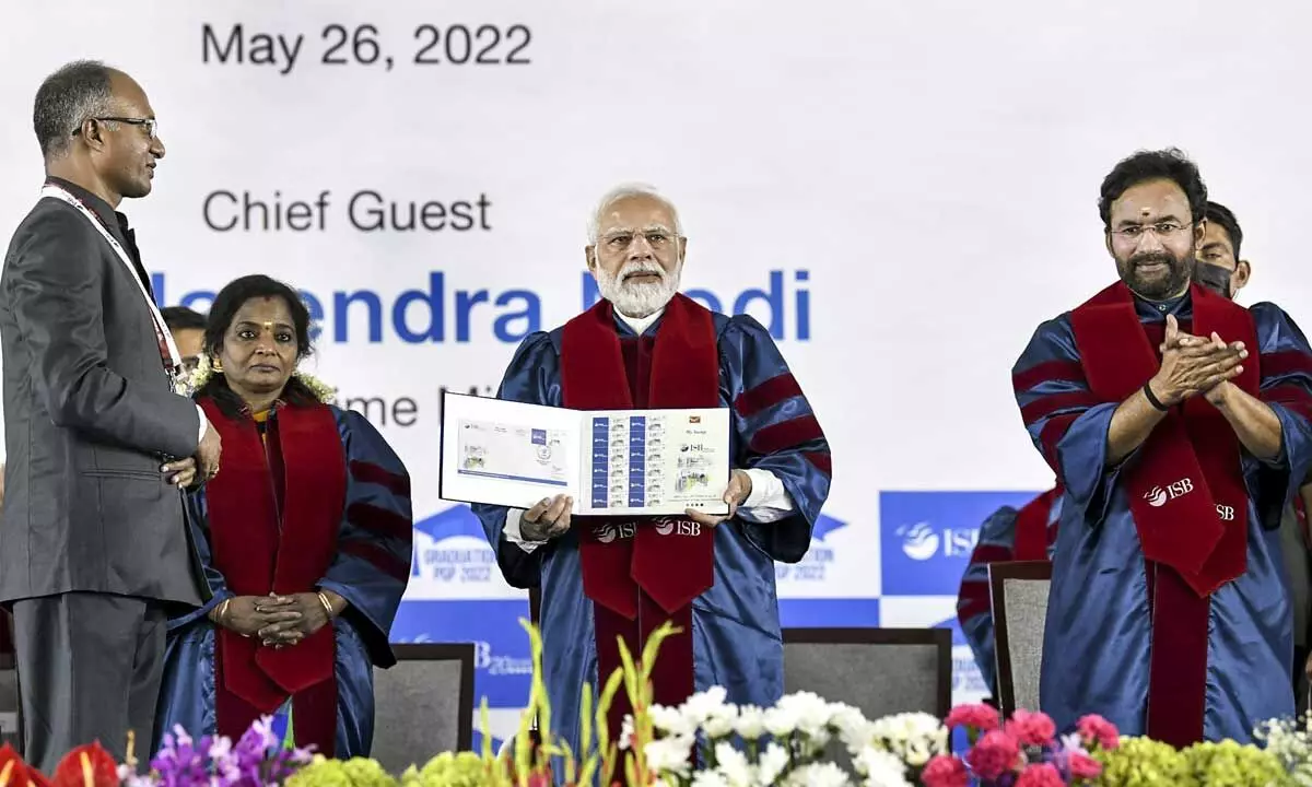 Prime Minister Narendra Modi flanked by Telangana Governor Tamilisai Soundararajan and Union Culture Minister G Kishan Reddy at the graduation ceremony of the Post Graduate Programme in Management (PGP) of 2022, at Indian School of Business (ISB) in Hyderabad on Thursday
