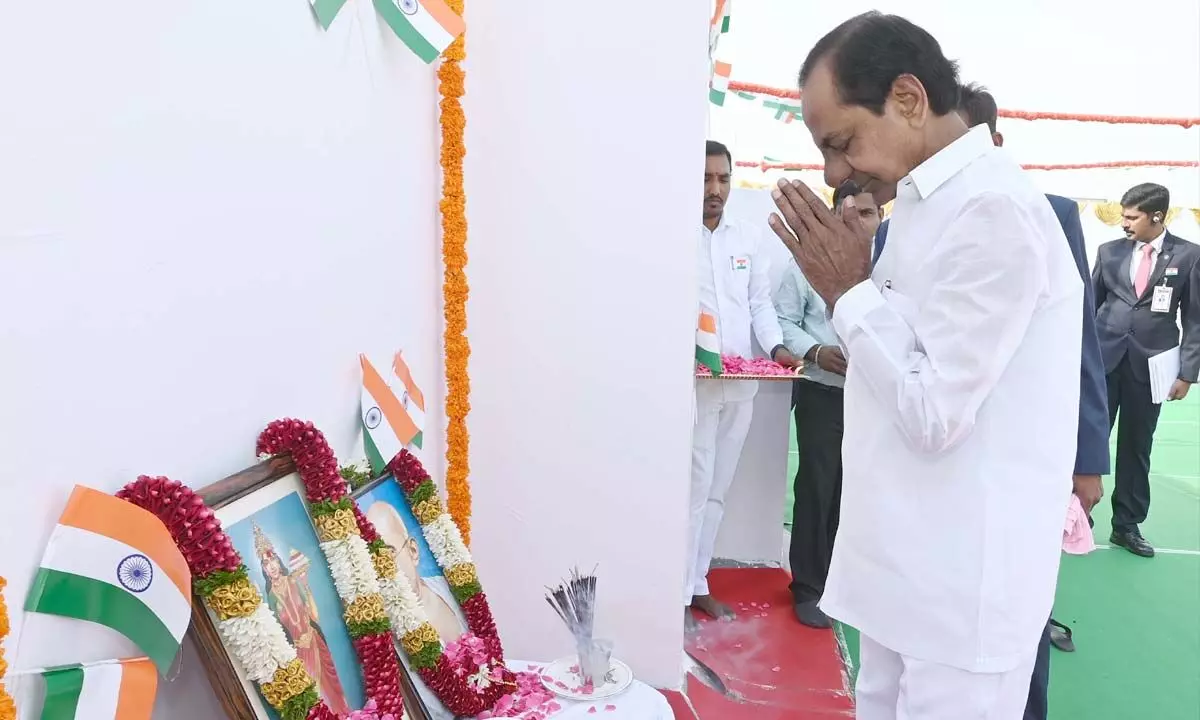 Chief Minister KCR paying floral tributes to the Telagana Matha portrait in Hyderabad
