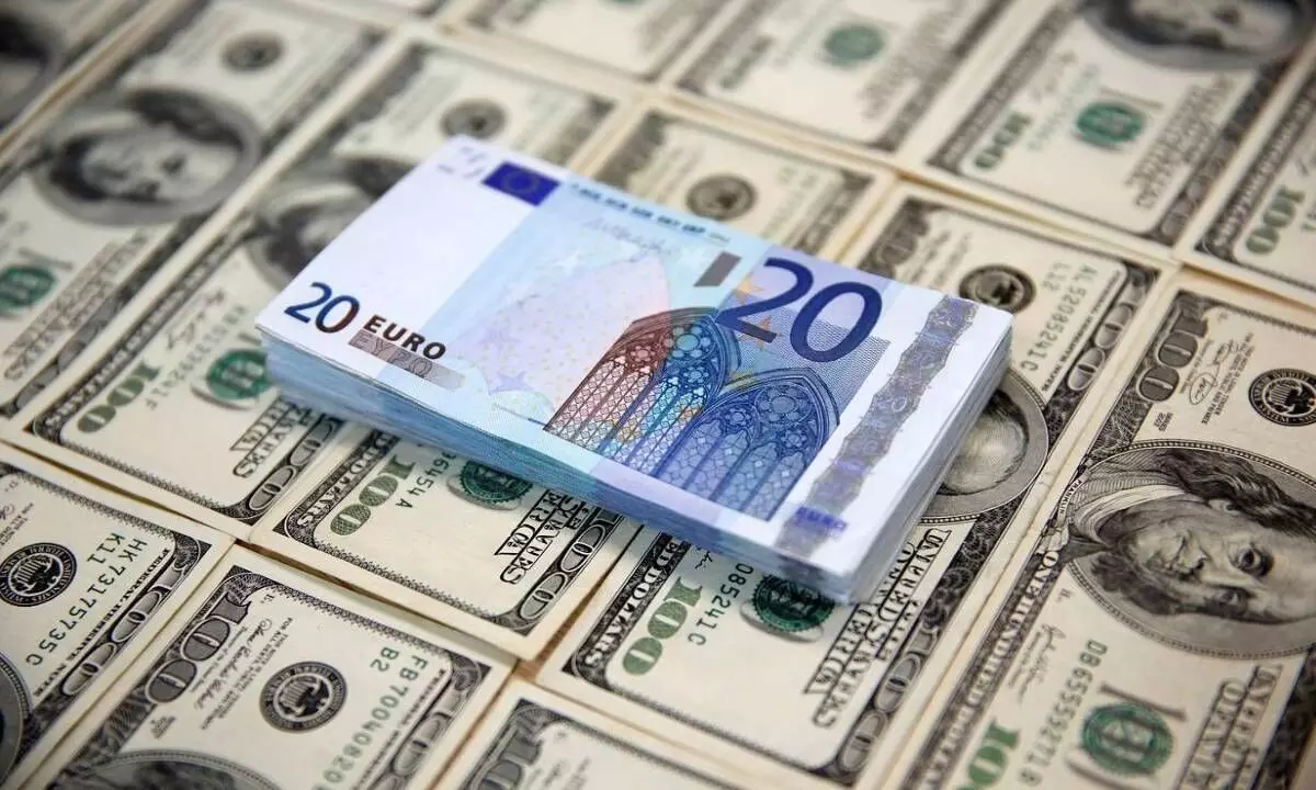 Euro reaches parity with dollar for the first time in 20 years