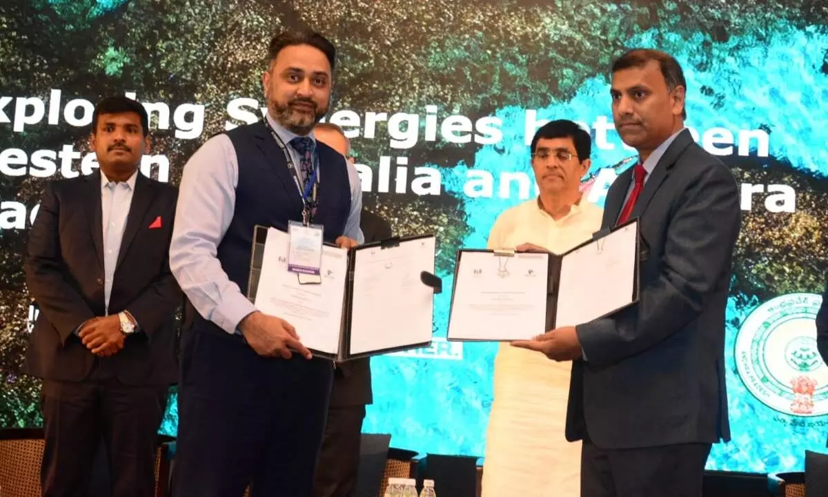 A Letter of Intent being signed between Western Australia and Andhra Pradesh at a meeting held by AP Economic Development Board in Visakhapatnam on Saturday. AP Finance Minister Bugganna Rajendranath and Industries Minister Gudivada Amarnath are seen