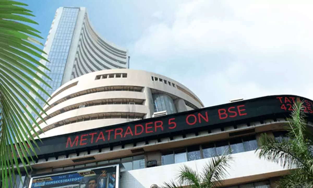 Indices end almost flat in choppy session