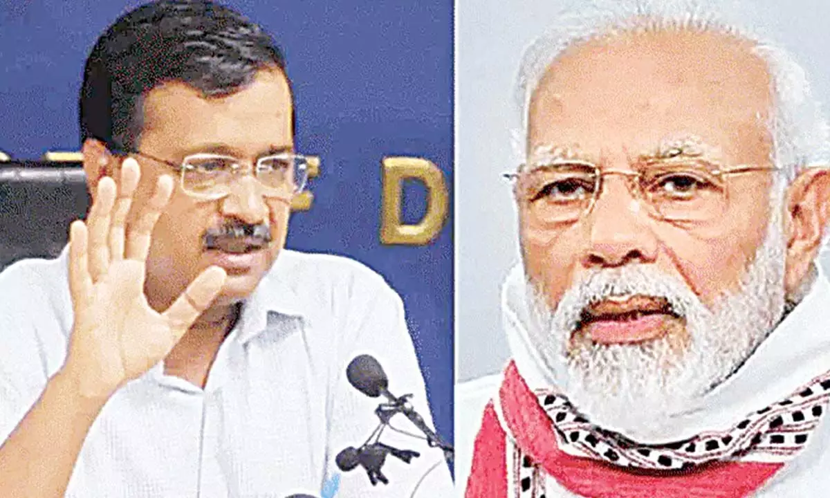 Delhi Chief Minister Arvind Kejriwal and  Prime Minister Narendra Modi