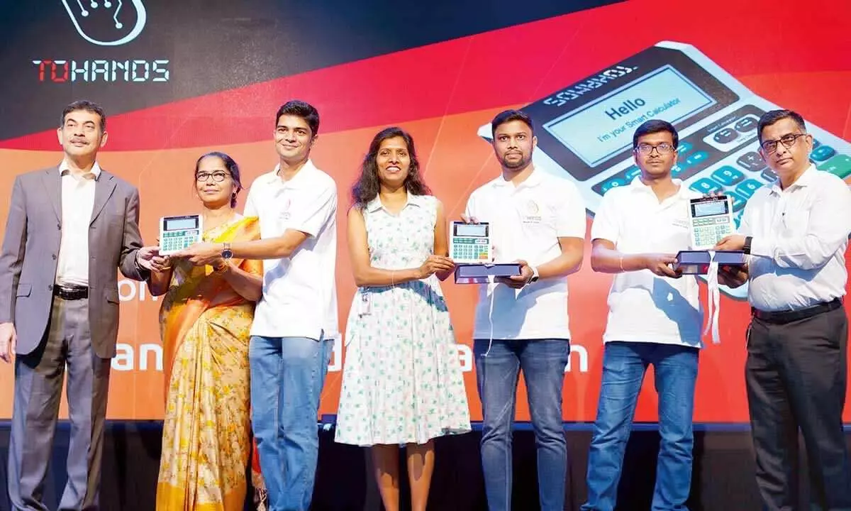 Telangana IT Secretary Jayesh Ranjan (L) launching Tohands Smart Calculator in Hyderabad on Monday