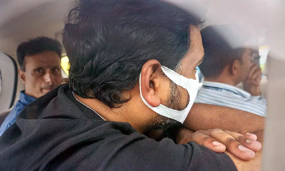 Abhishek Boinpally following his arrest by CBI officials in New Delhi on Monday