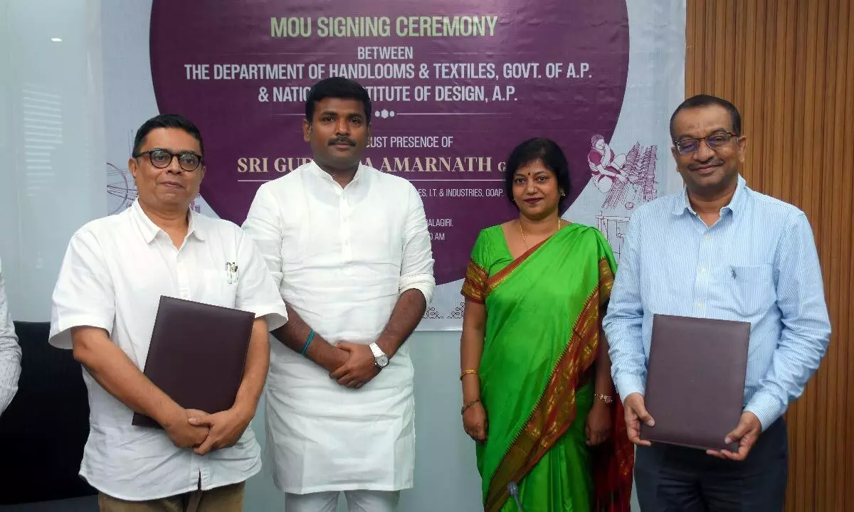 (2nd from left) Minister Gudivada Amarnath at the MoU signing ceremony held at Vijayawada on Wednesday