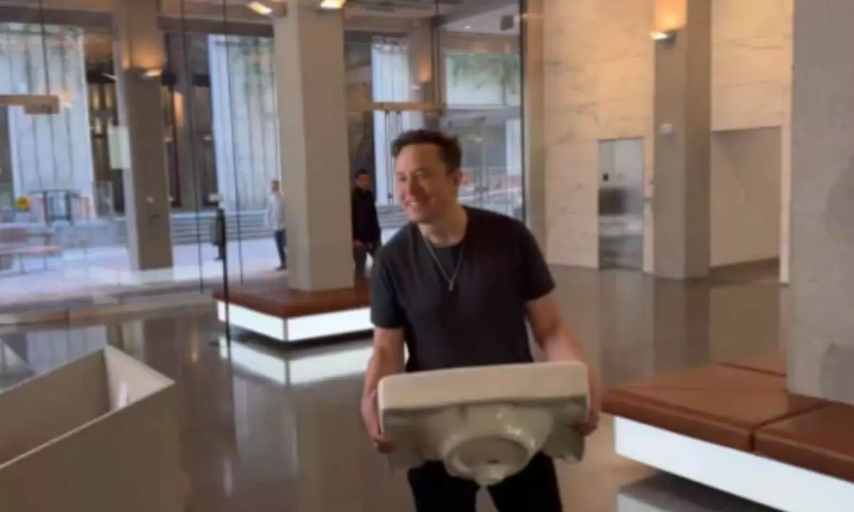 Musk visits Twitter HQ, with a sink in his hand